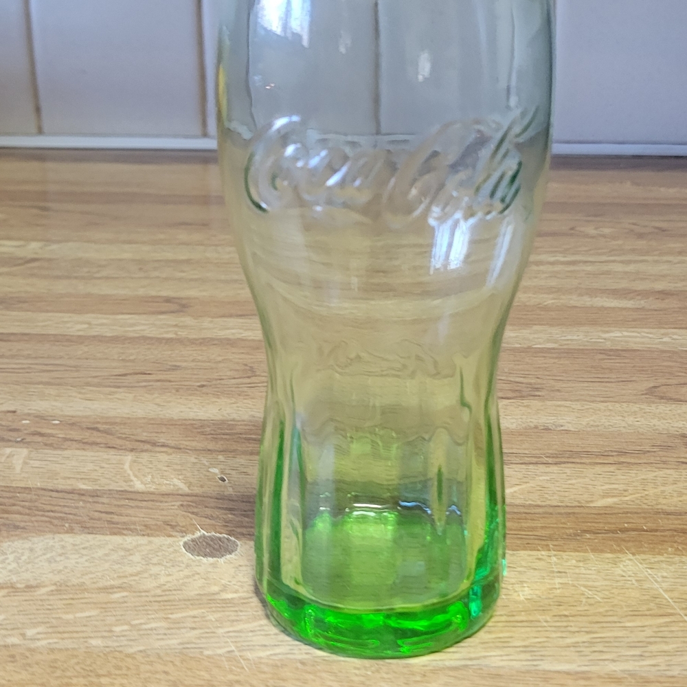 Coca-Cola Embossed Green Glass